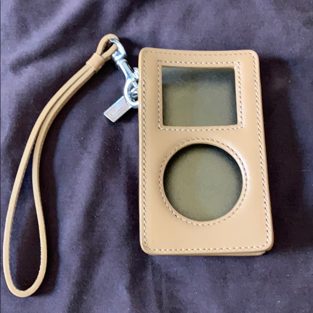 NOT FOR SALE
Coach tan leather iPod case
